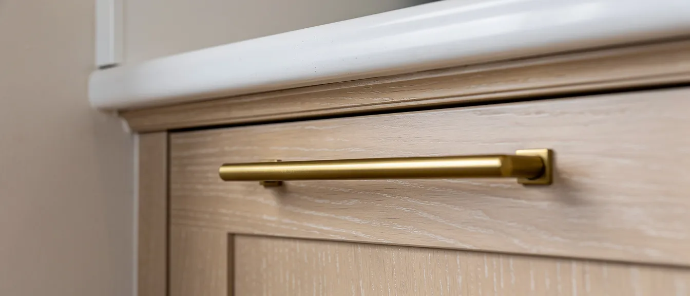 Cabinet hardware alignment and crown molding detail